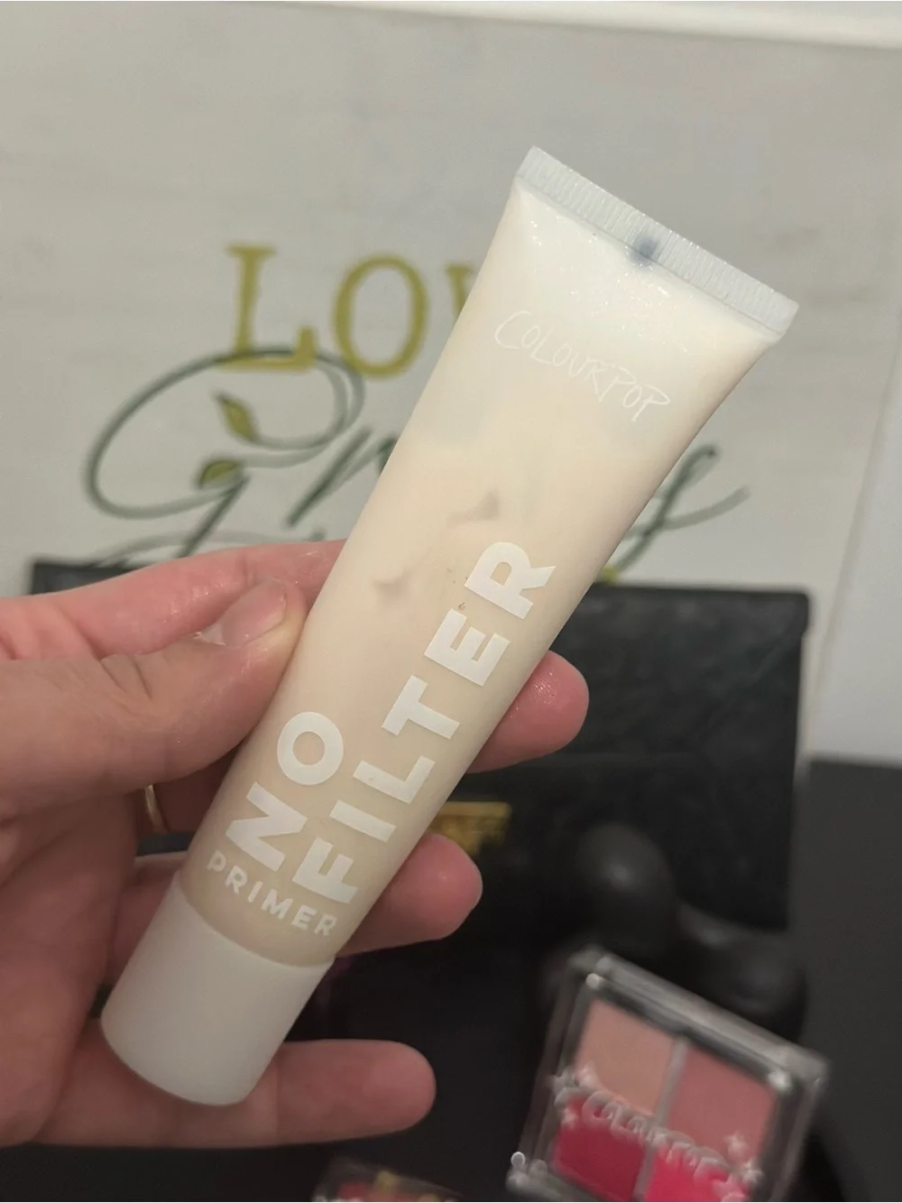 Makeup essentials (7 pieces) with pouch.